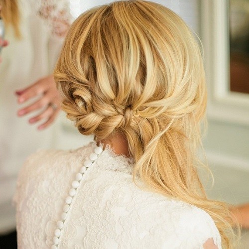 Blonde messy braid and side ponytail