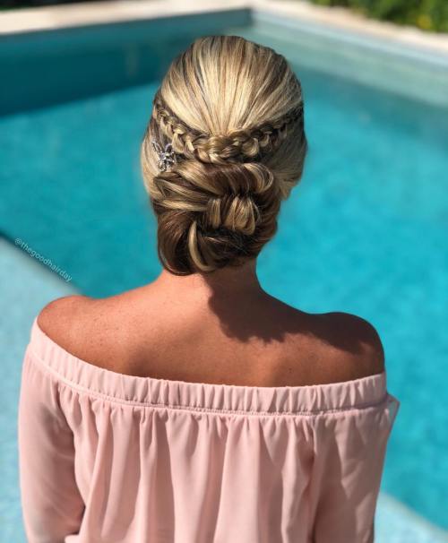 Braided low bun party hairstyle