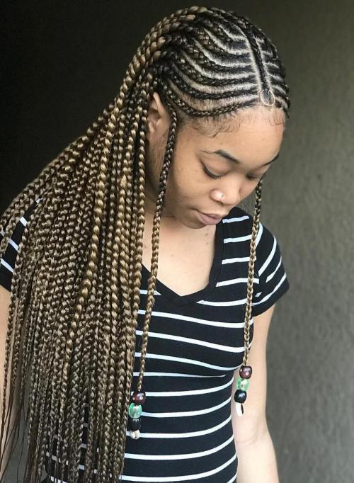 Curved fulani braids with braided centre parting