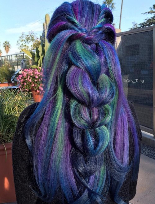 DARK BLUE HAIR WITH GREEN AND PURPLE HIGHLIGHTS