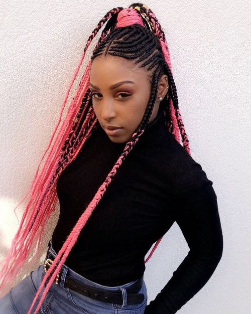 Fulani braids with bright pink yarn extensions