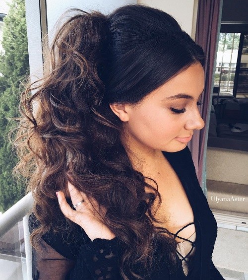 Long curly side ponytail with a bouffant