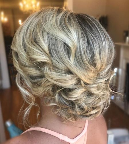 Low curly blonde updo