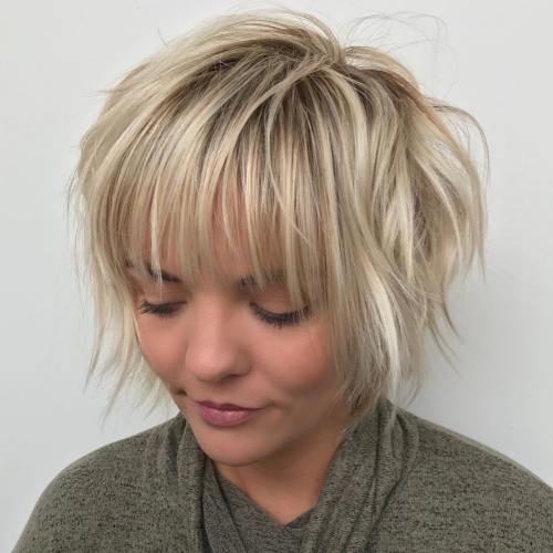 Messy feathered pixie bob with bangs