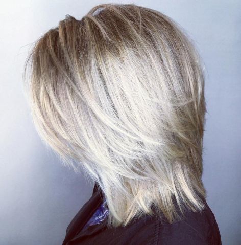 Midlength blonde layered hairstyle