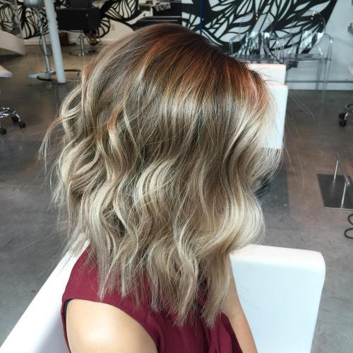 SHOULDER LENGTH LAYERED WAVY HAIRSTYLE