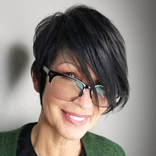 Straight black pixie with long side bangs