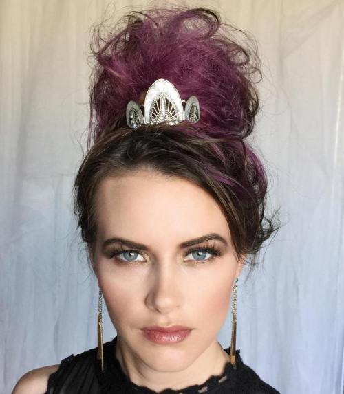 High messy bun with a crown accessory