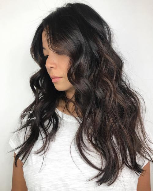 Long tousled brunette hairstyle