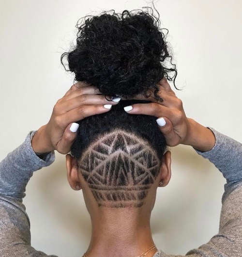 Natural hairstyle with shaved nape designs