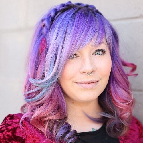 Pastel purple balayage hair with layered bangs