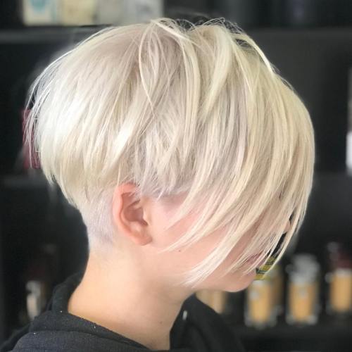 White blonde layered pixie with undercut