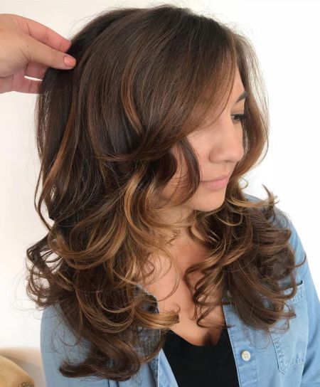 Long layered curled hairstyle