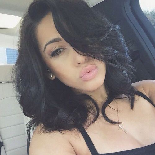 Jet Black Hairstyles with Sultry Curls