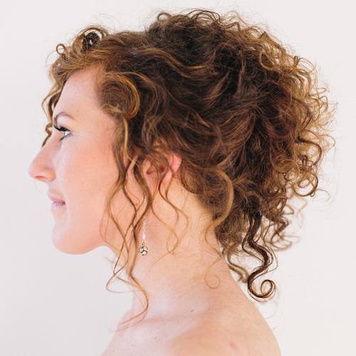 Loose curly ponytail