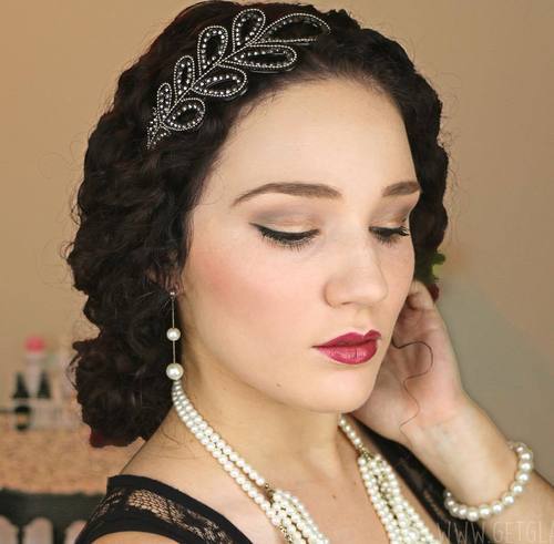 Low vintage updo for curly hair