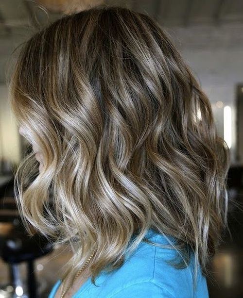 Medium Curly Hairstyle with Ombre Highlights