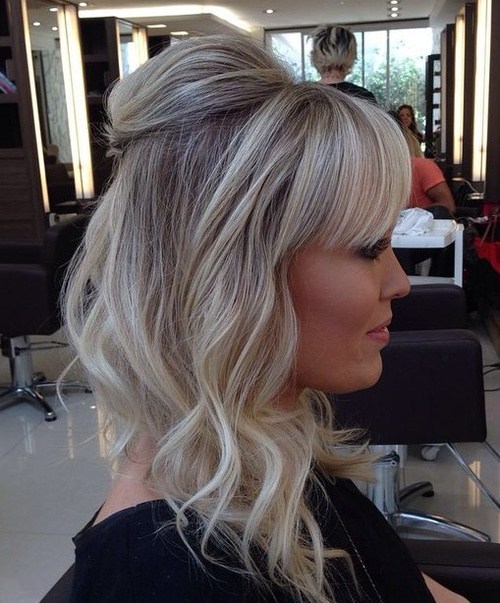 Ash blonde hairstyle with bangs