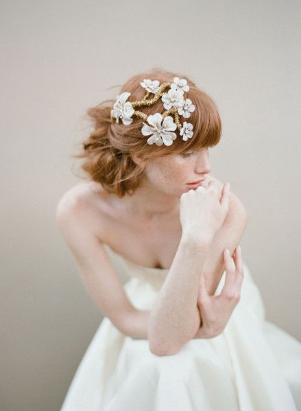 TRENDY CURLY UPDO WITH BANGS AND HAIR FLOWERS