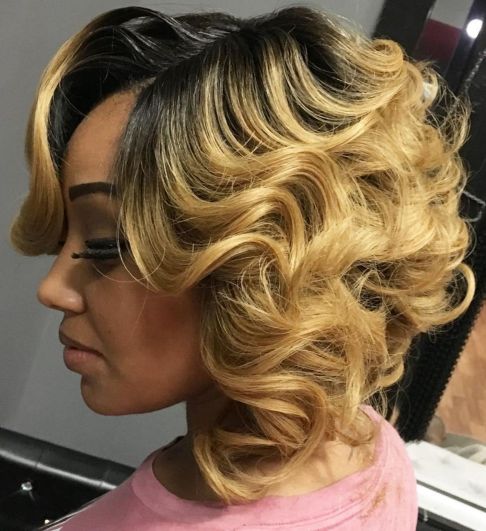 Blonde curly bob with black roots