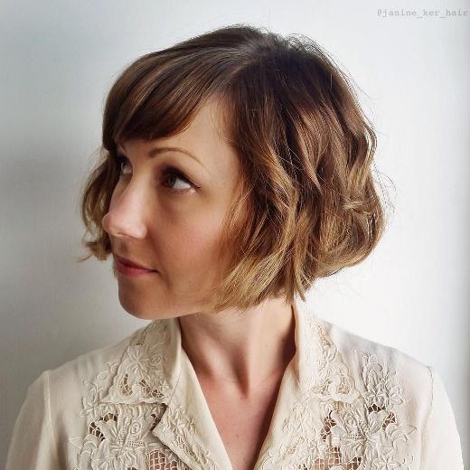 JAW LENGTH CURLY BOB WITH BANGS