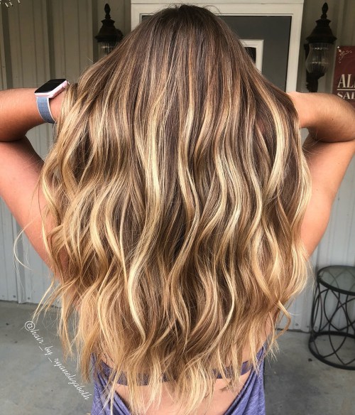Light brown hair with golden blonde balayage