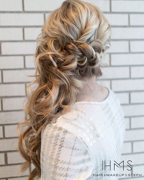 Long curly ponytail with a braid