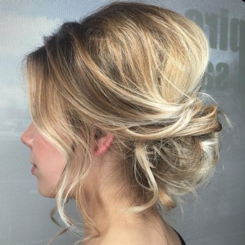Loose messy updo with a bouffant