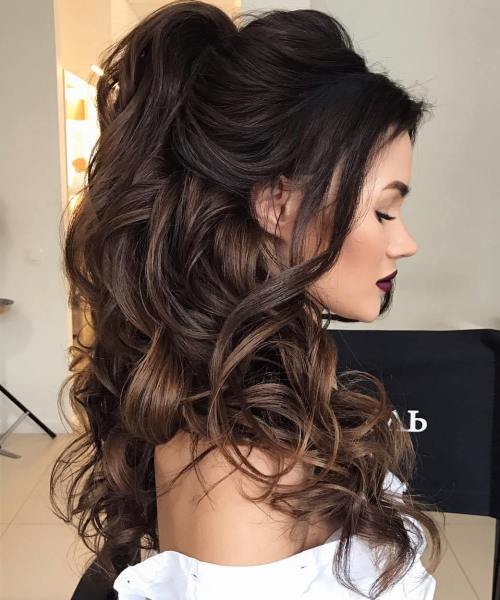 Curly long half updo for a bride