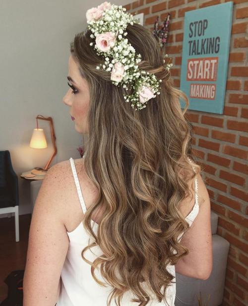 Simple bridal half updo with a flower crown