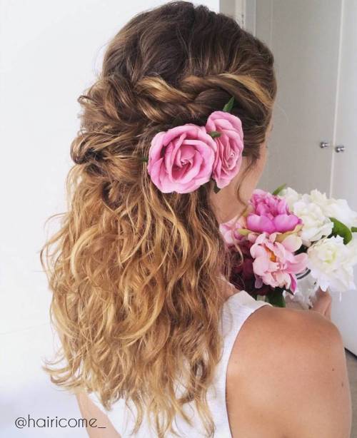 twisted half updo with flowers