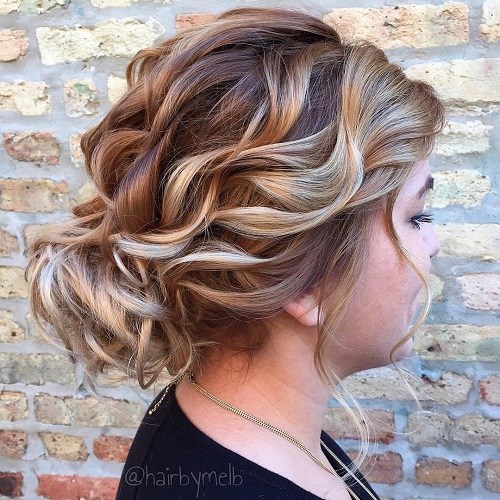 Curly loose updo for round face