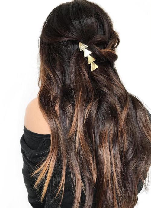 Long brown hair with subtle caramel highlights