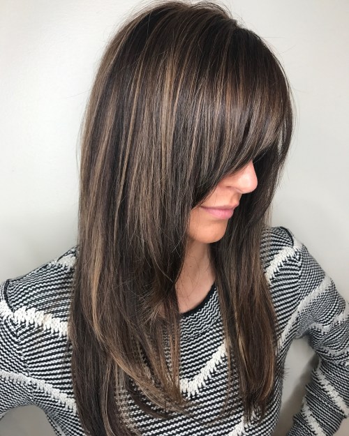 Long brunette hairstyle with layered ends