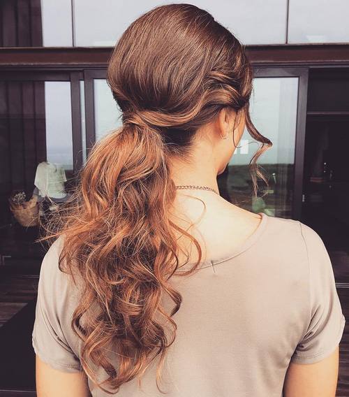Long curly messy ponytail