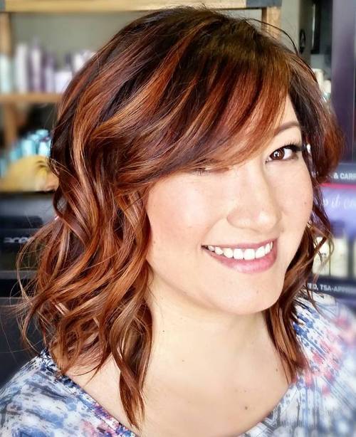 Long wavy bob with bangs for round faces