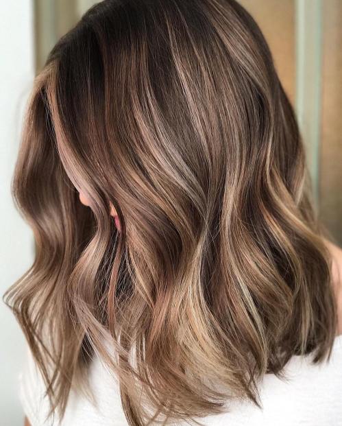 Thick brown hair with subtle highlights